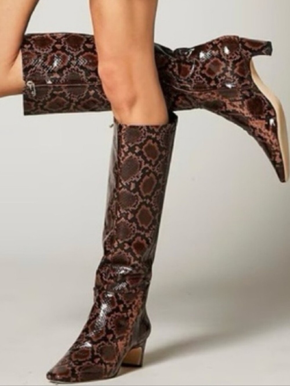 Antonio Melani snake patent leather knee-high dress boots.